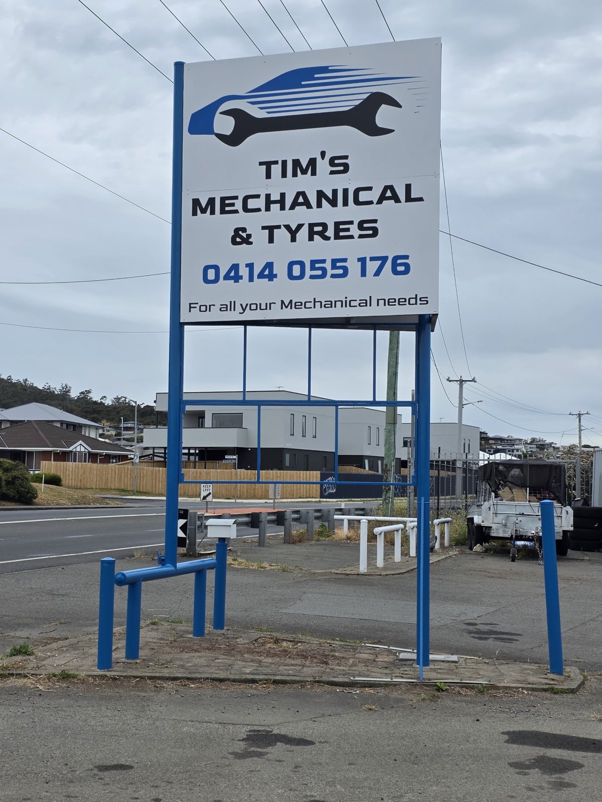 Tim’s Mechanical & Tyres roadside sign on South Arm Road with the phone number 0414 055 176